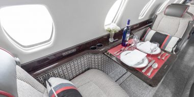 Interior of Citation X Private Jet- chairs and table setup